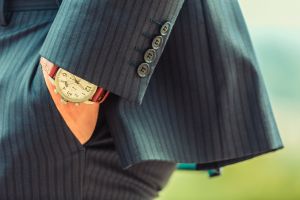 Close up of hand in pocket of Caucasian businessman