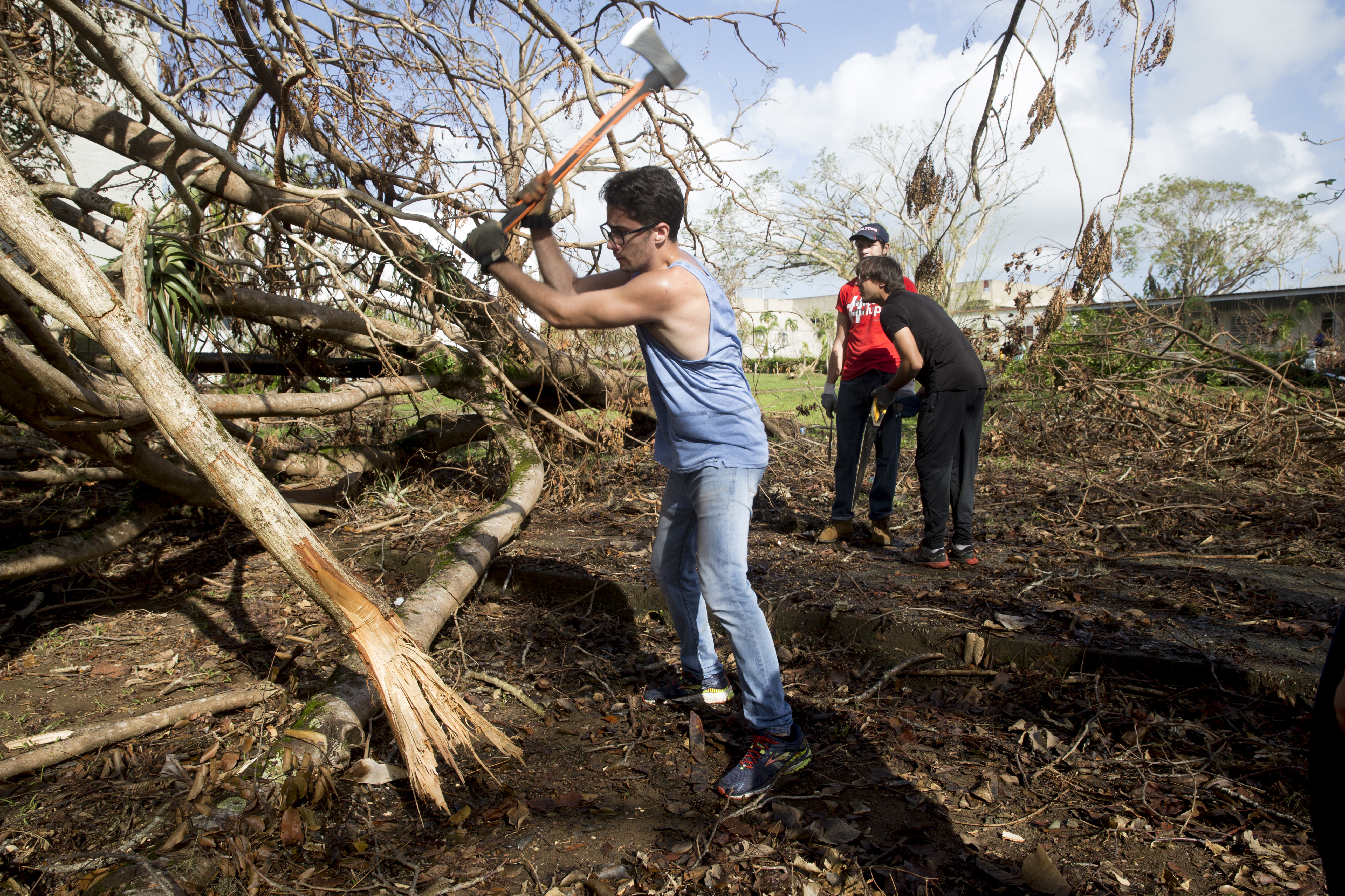 Students and faculty clean up University of Puerto Rico after Hurricane Maria.