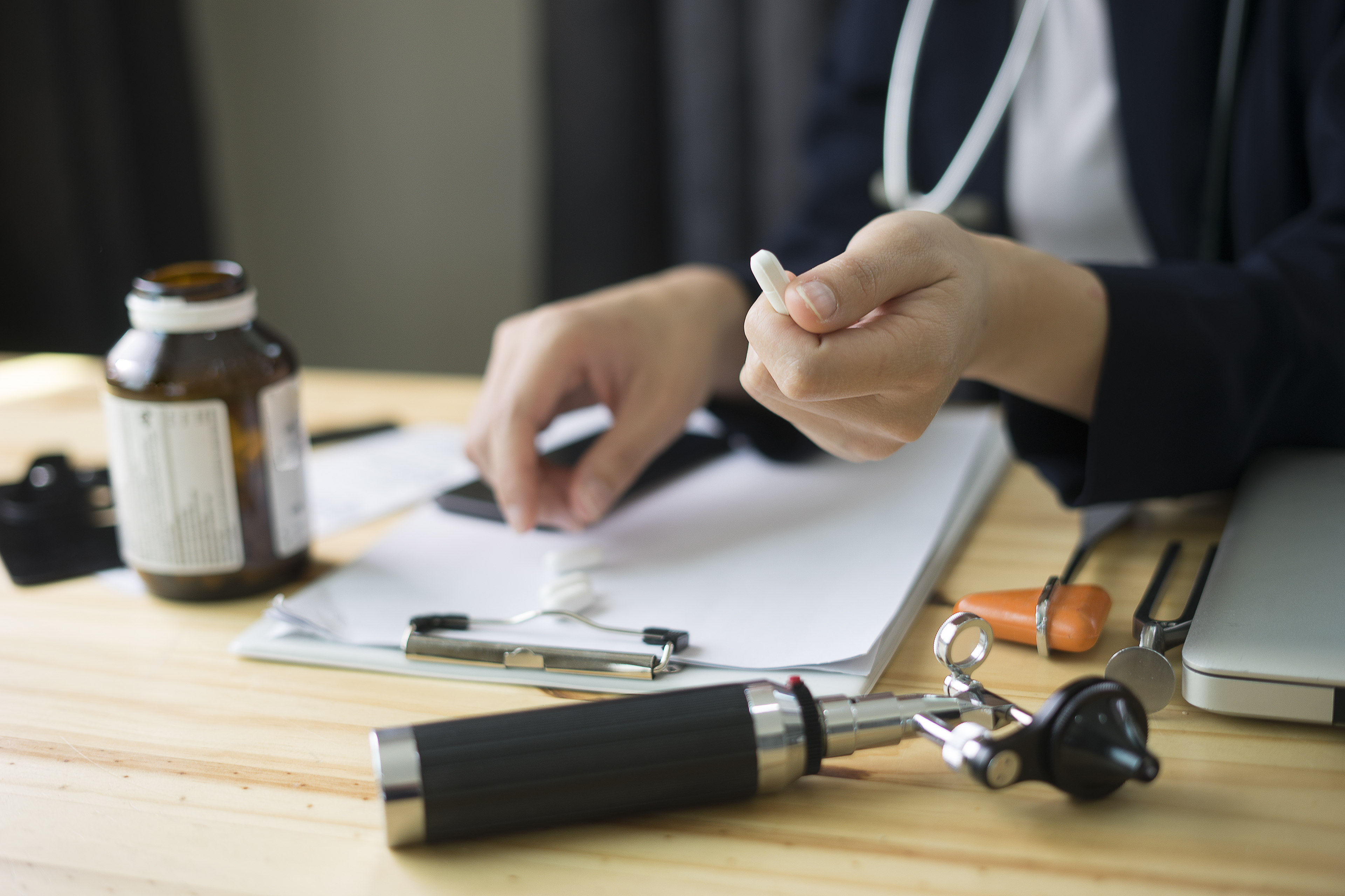 Asian Doctor waiting patient for Check up health