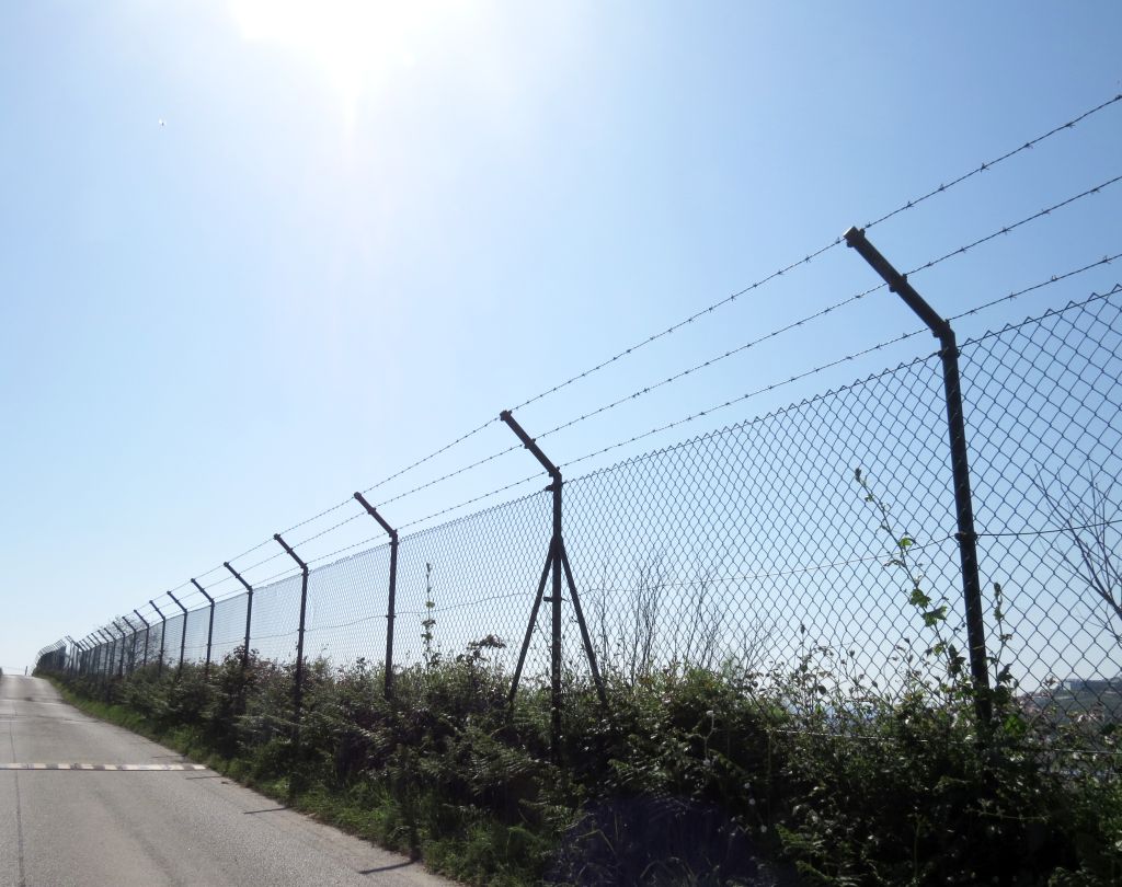 Border fence wall against illegal immigration
